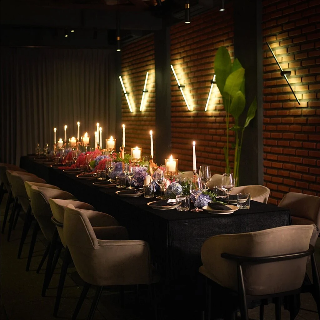 A candlelit dinner with considered table styling